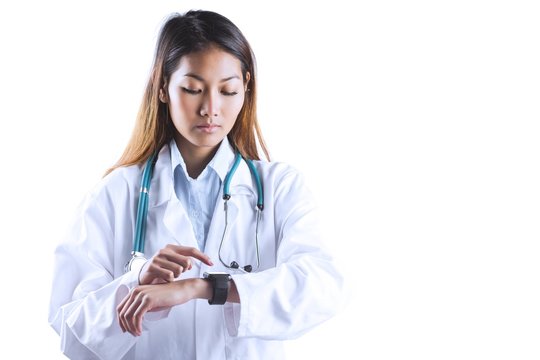 Asian Doctor Using Her Smart Watch