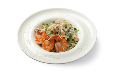 Pasta with shrimps and salmon. High angle view.