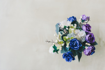 Fake flower on wood table