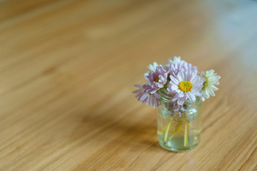 Flower on wood table