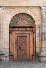 Wooden entry portal gate of old medieval house