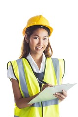 Architect woman with yellow helmet and plans
