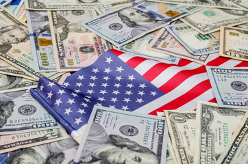 American flag and dollar bills