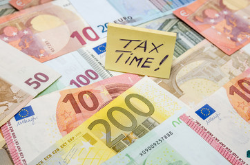 euro banknotes stacked by value