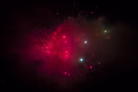 fireworks explosion seems like as distant galaxies in the sky