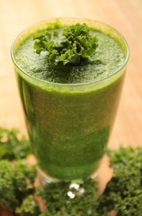 Healthy green smoothie with kale in a glass