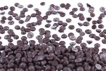 Chocolate chips isolated on white