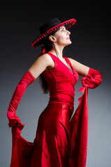 Woman dancing dances in red dress
