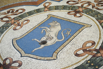 Mosaic bull in the floor of the Vittorio Emanuele Gallery, Milan