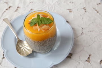Homemade Chia seed pudding with mango, selective focus, toning
