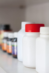 bottles on pharmacy store shelf