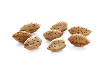 Fototapeta na wymiar almond nuts isolated on white background