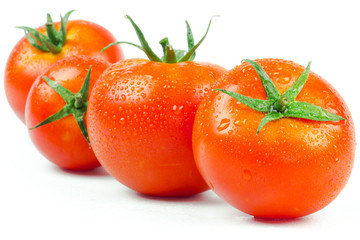 Tomatoes. Whole and a half isolated on white