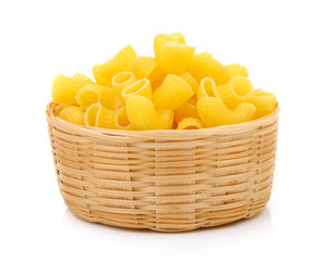 dry macaroni in the basket on white background