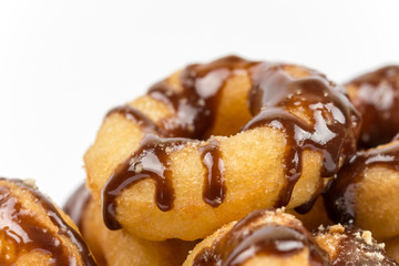 Macro view of chocolate donuts isolated on white