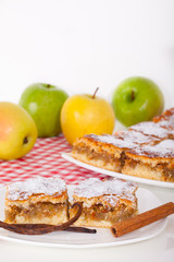 Fresh baked crumble apple on white plate