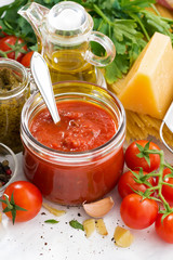 tomato sauce and ingredients for pasta, vertical