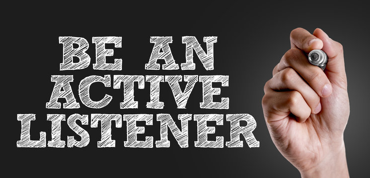 Hand writing the text: Be An Active Listener