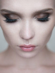 Obraz premium Woman eye with beautiful makeup and long eyelashes.
