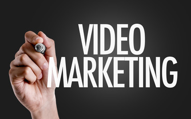 Hand writing the text: Video Marketing