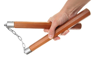 Nunchaku in a hand to isolate on the white