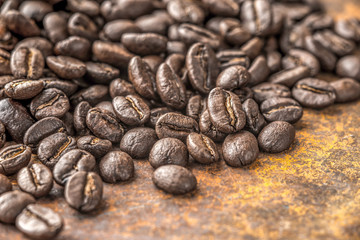 Coffee beans on a metal table