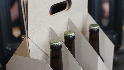 beer bottle in a cardboard box
