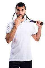 Tennis player covering his mouth