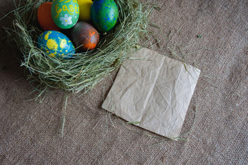 Easter eggs in the hay with Kraft paper