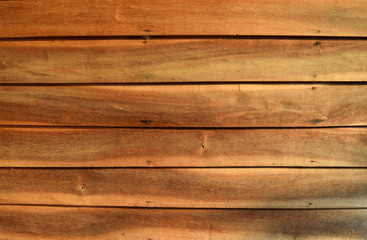 Naklejka premium old wooden wall with nails hammered is orange tone