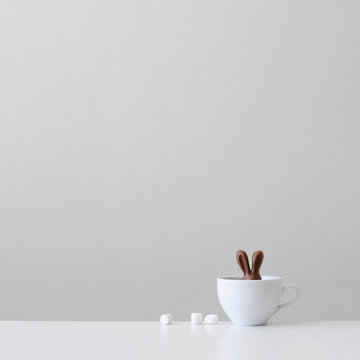 chocolate bunny in a white cup