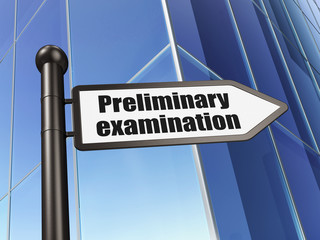 Obraz premium Studying concept: sign Preliminary Examination on Building background