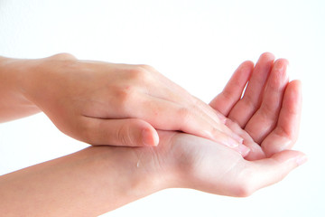 Fototapeta premium handing cream on hand with isolated background