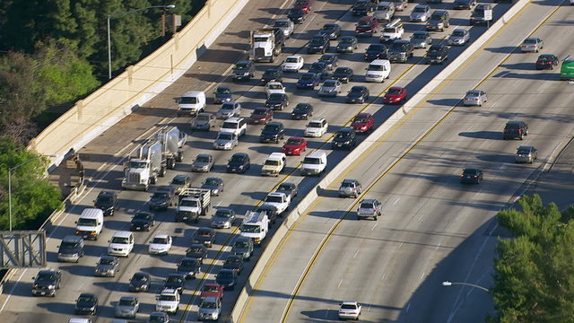 Aerial view of rush hour traffic on busy freeway