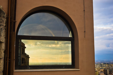 Reflection of a sunset in Cagliari downtown, Sardinia, Italy