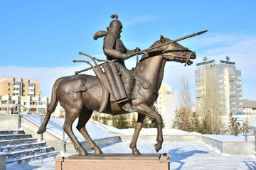 Statue featuring a historic Kazakh warrior in front of the Historical Museum in Astana, Kazakhstan