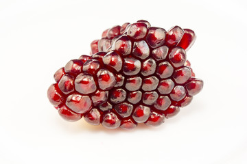pomegranate seeds isolated on white background

