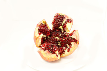 pomegranate seeds isolated on white background

