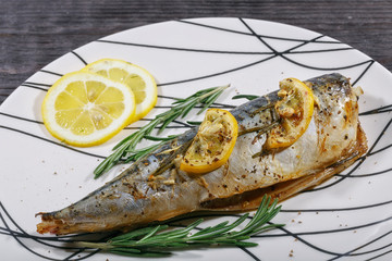 Grilled mackerel fish with lemon and rosemary