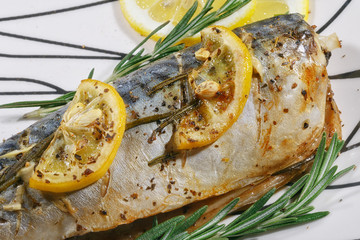 Grilled mackerel fish with lemon and rosemary