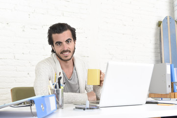 Fototapeta na wymiar student preparing university project or hipster style freelancer businessman working with laptop