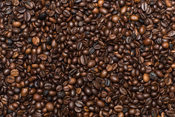 roasted coffee beans close up background texture