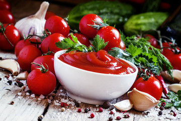 Tomato sauce with herbs and spices, selective focus