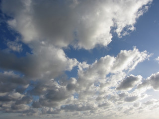 Sky with giants cumulonimbus clouds and sun rays through