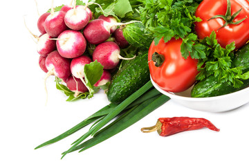 Fresh vegetables on a white background.