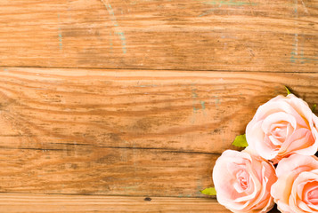 Roses on wood, copy space