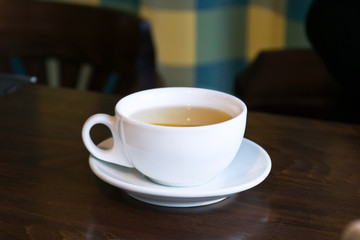Breakfast tea in a cafe.Cup on a table