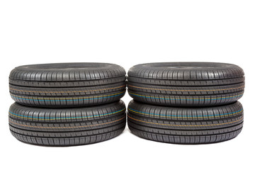 Car tires on white background.