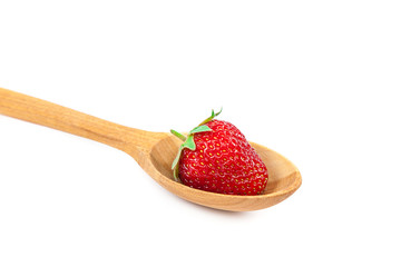 Fresh strawberries in wooden spoon.