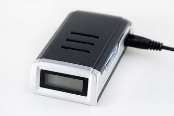 the charger for accumulators on a white background